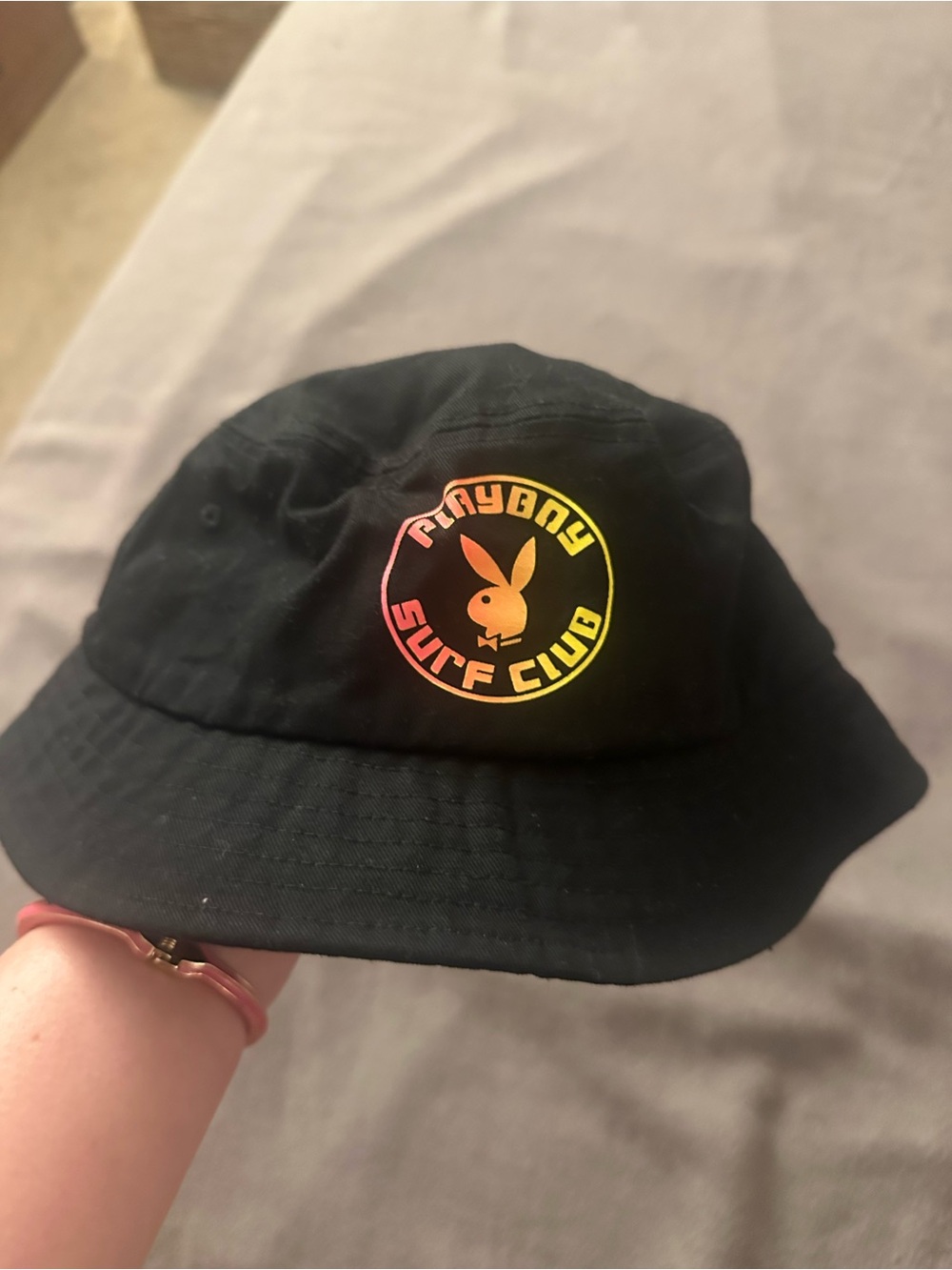 PLAYBOY Black Bucket Hat with Yellow-Orange-Pink Gradient Logo